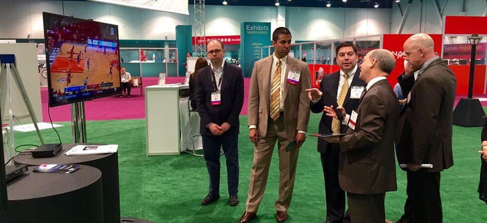 FCC Commissioners Ajit Pai and Mike O'Rielly at the NAB Labs Next Generation Hyrid TV Booth at the 2015 Futures Park.